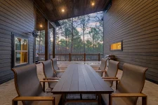 Nighttime exterior view of II Elks Lodge luxury cabin