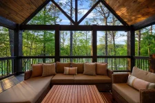 Hygge Hideaway cabin front view surrounded by trees in Broken Bow