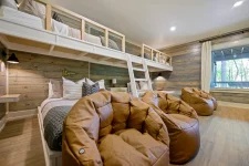 Hygge Hideaway cabin covered deck with outdoor seating