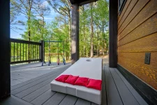 Hygge Hideaway cabin wooded setting at Pine Lake Resort