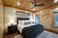 Red Baron Lodge deck with forest views Broken Bow