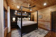 Red Baron Lodge additional bedroom with luxury bedding